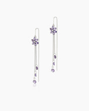 Purple tassel earrings with lavender-hued zircon blossoms and cascading silver-tone chains