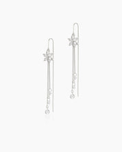 White tassel earrings with white-hued zircon blossoms and cascading silver-tone chains