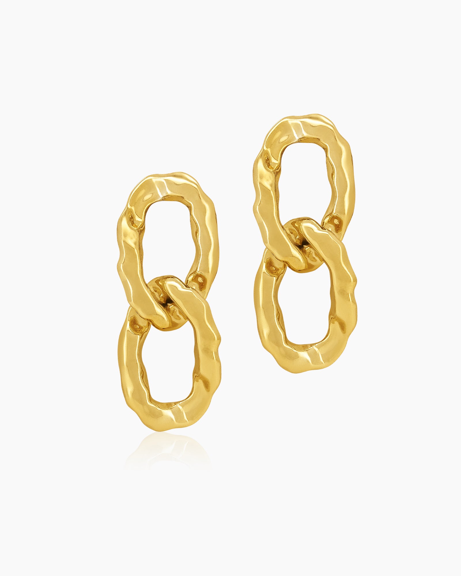 Glamorous silver earrings with oversized interlocking links and a high-shine, mirror-like finish