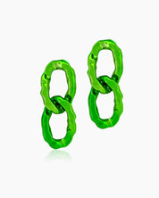Glamorous green earrings with oversized interlocking links and a high-shine, mirror-like finish