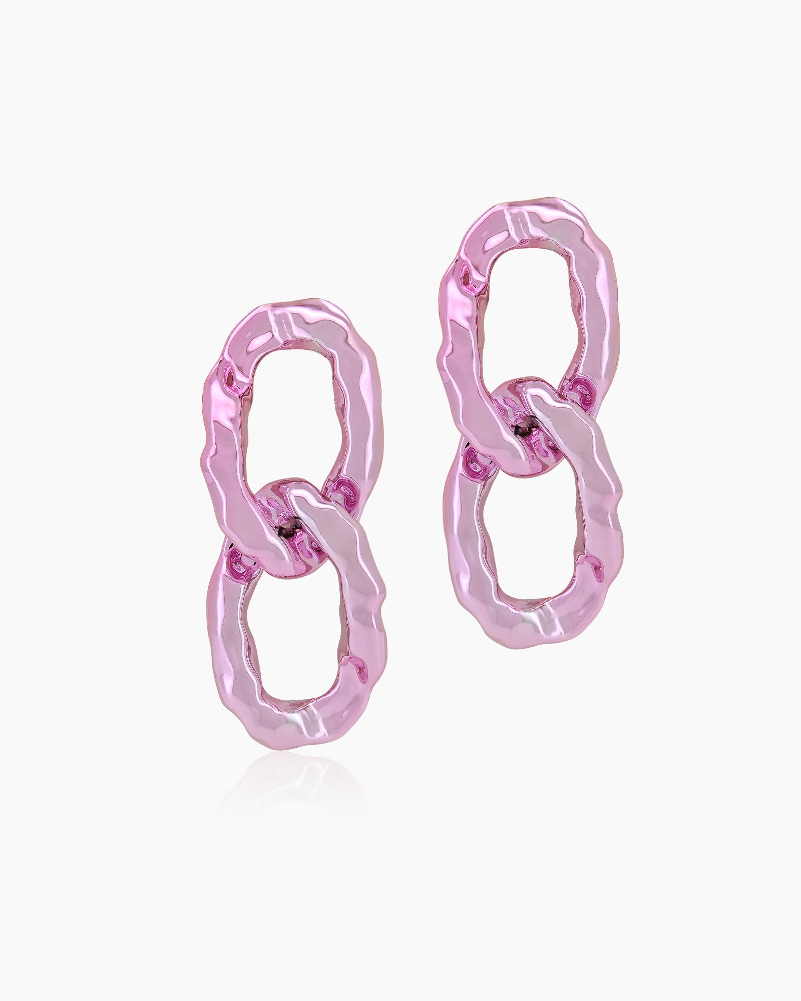 Glamorous pink earrings with oversized interlocking links and a high-shine, mirror-like finish