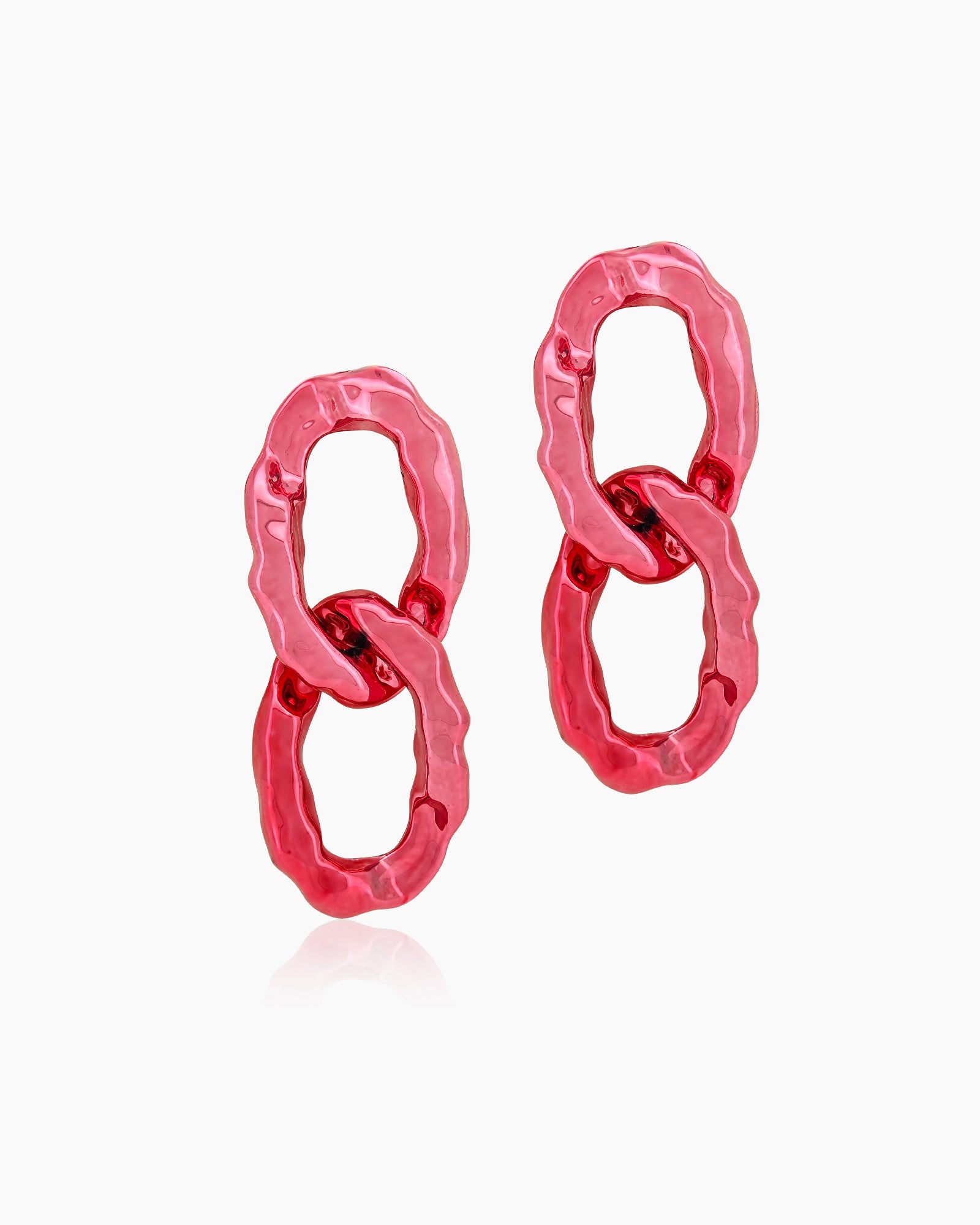 Glamorous red earrings with oversized interlocking links and a high-shine, mirror-like finish