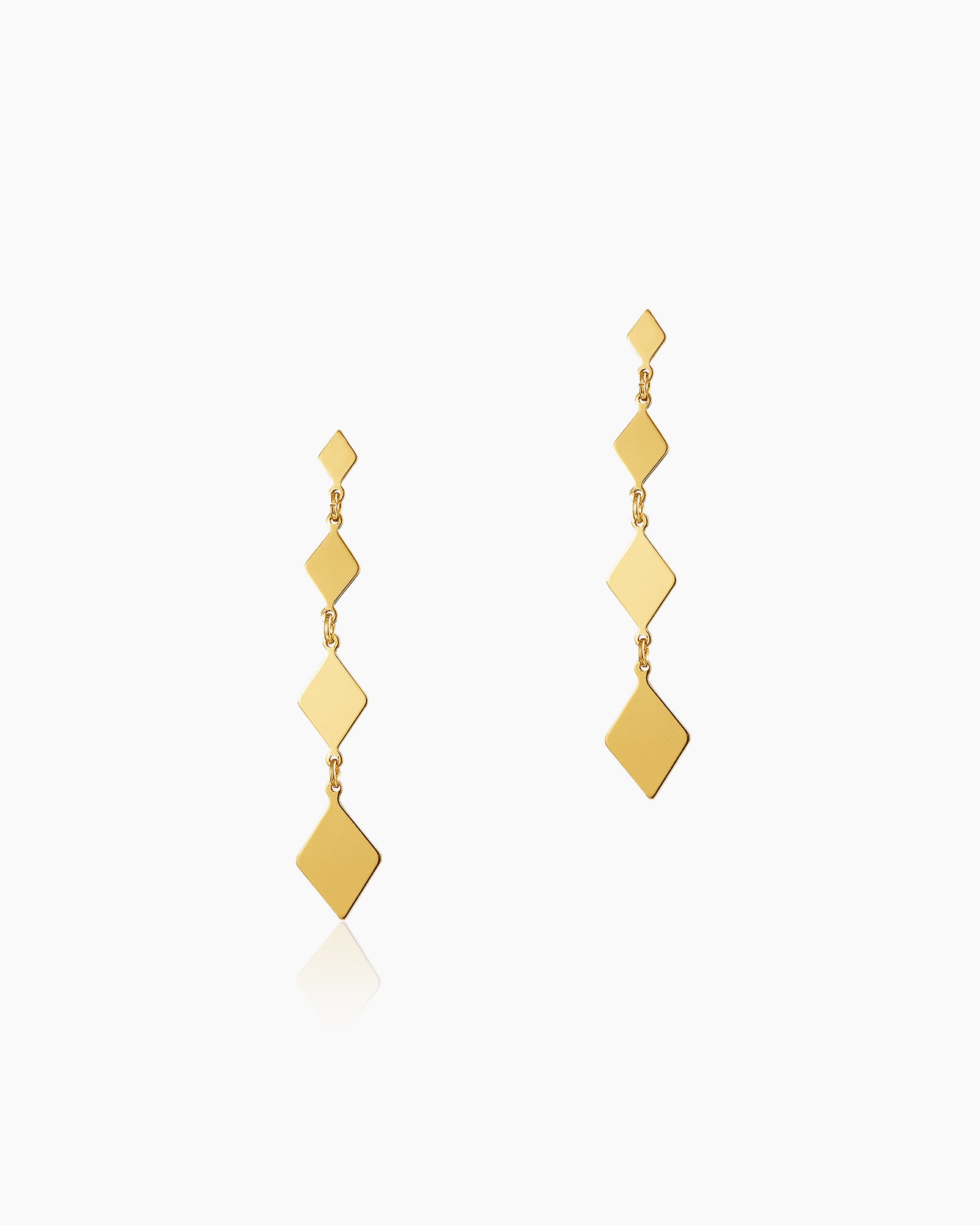 Dangle earrings with a series of gold-tone diamond-shaped links that create graceful movement
