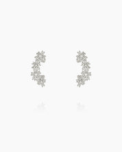 Ear cuffs with shimmering zircon blossoms, designed to hug the curve of the ear for a sparkling look