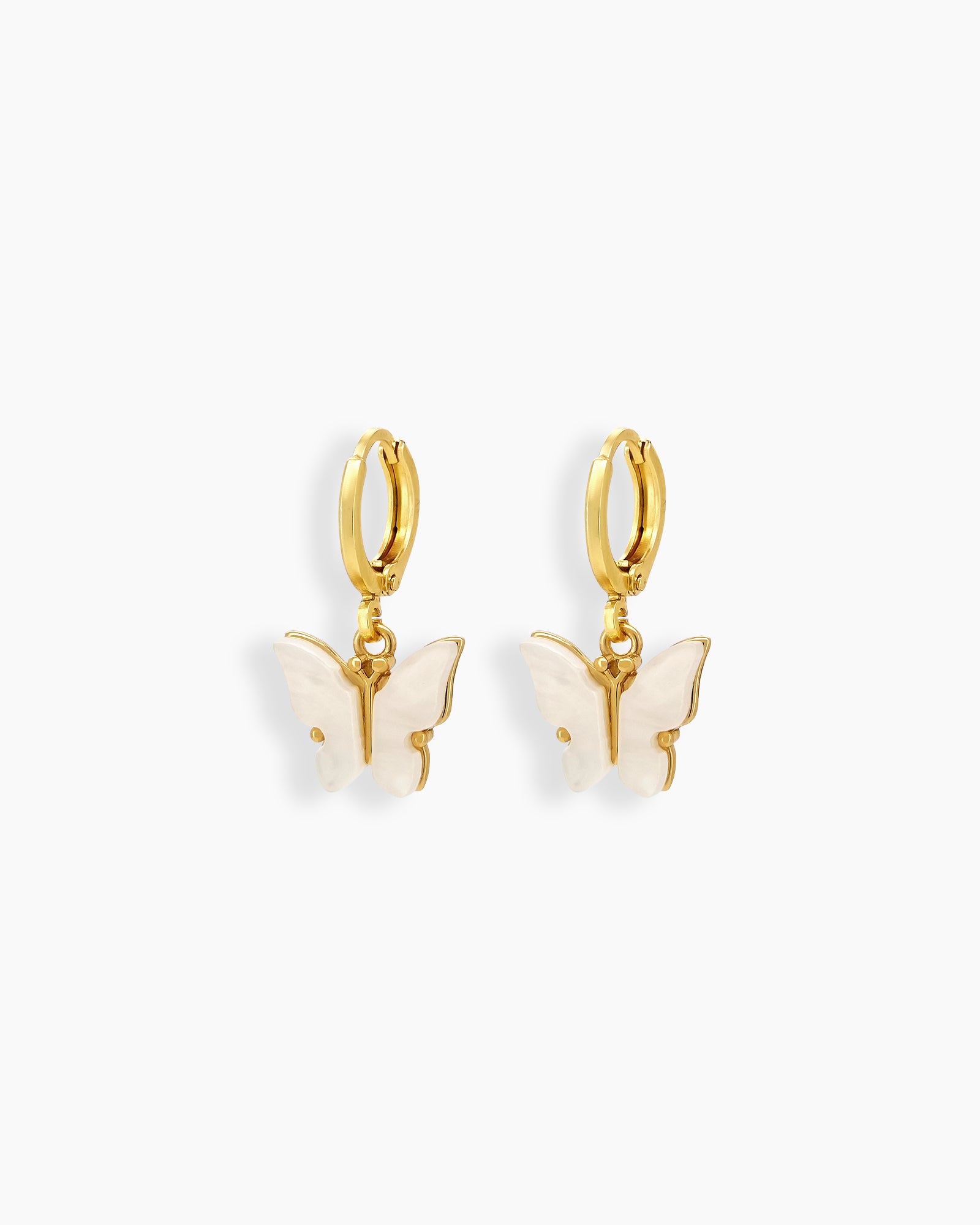 Dainty huggie hoop earrings with mother-of-pearl butterfly wings in radiant gold-tone frames