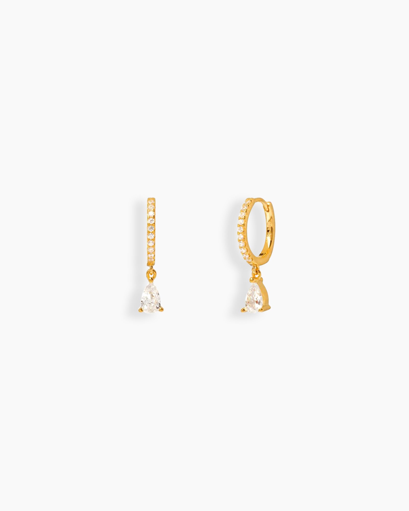 White drop earrings with a slim gold-tone hoop encrusted in pavé-set zircons and a pear-shaped drop