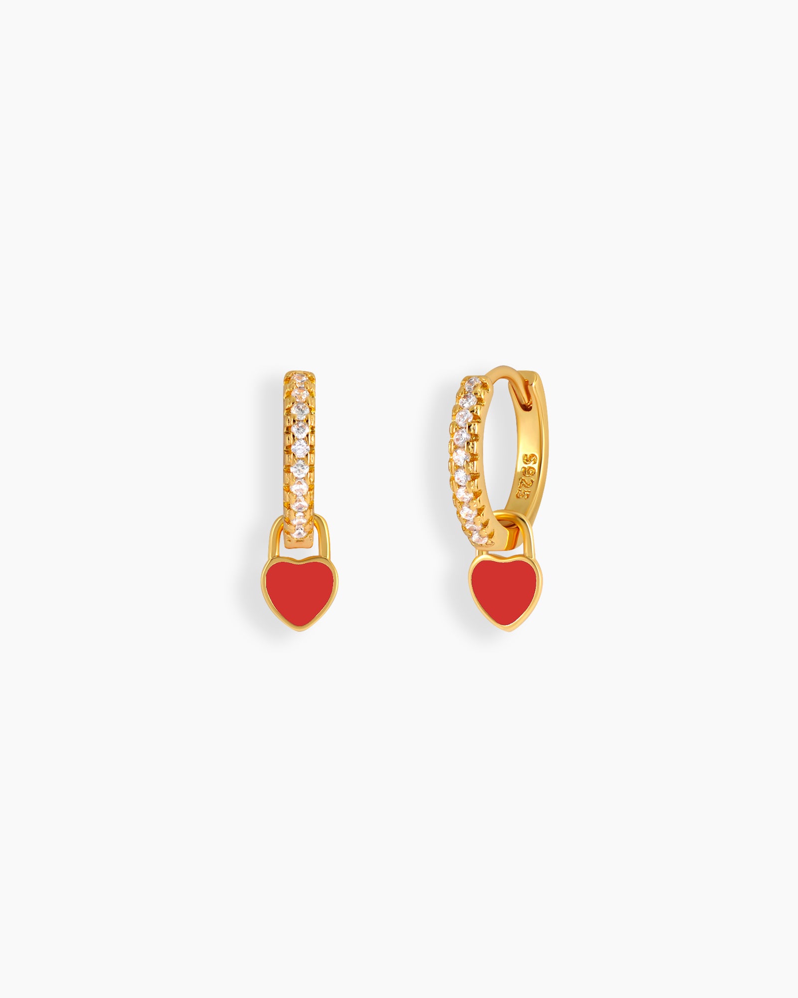 Red drop earrings with a zircon-encrusted huggie and a glossy enamel heart charm that swings with movement