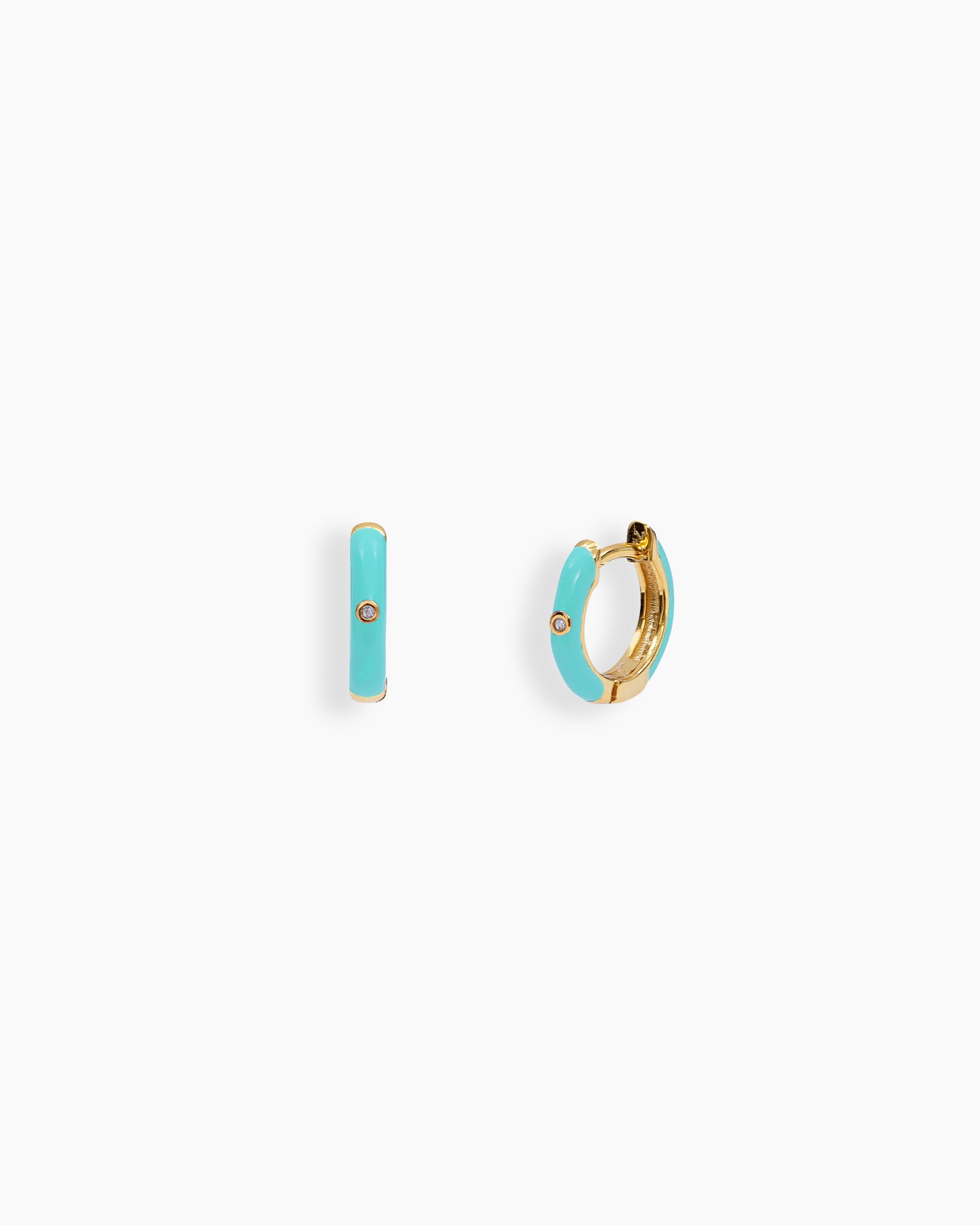Light-blue mini hoops coated in glossy enamel and accented with a single sparkling zircon for a playful twist