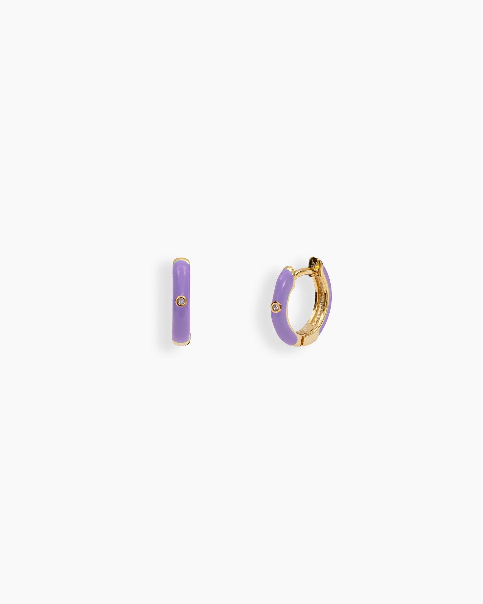 Purple mini hoops coated in glossy enamel and accented with a single sparkling zircon for a playful twist