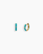 Turquoise mini hoops coated in glossy enamel and accented with a single sparkling zircon for a playful twist