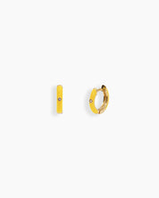 Yellow mini hoops coated in glossy enamel and accented with a single sparkling zircon for a playful twist
