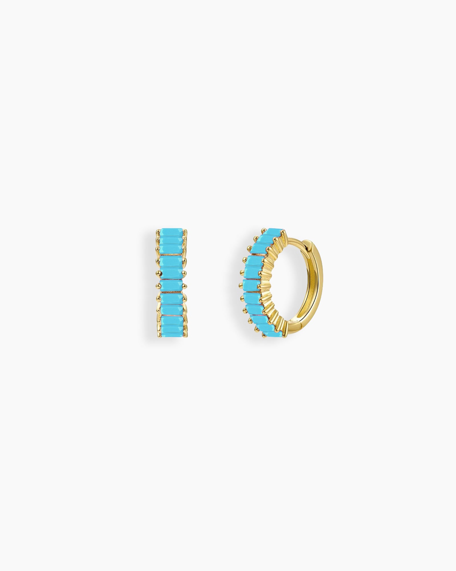 Turquoise-blue huggie earrings with a row of baguette-cut zircon stones in a sleek channel setting