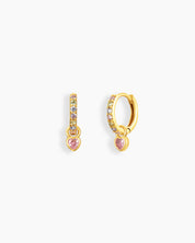 Pink drop earrings with a polished gold-tone huggie, pavé-set zircons, and a heart-cut drop charm