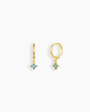 Light-blue drop earrings with a slim gold-tone huggie and a dainty flower-shaped zircon drop