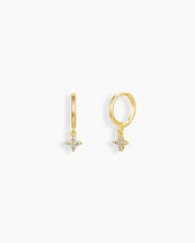 White drop earrings with a slim gold-tone huggie and a dainty flower-shaped zircon drop