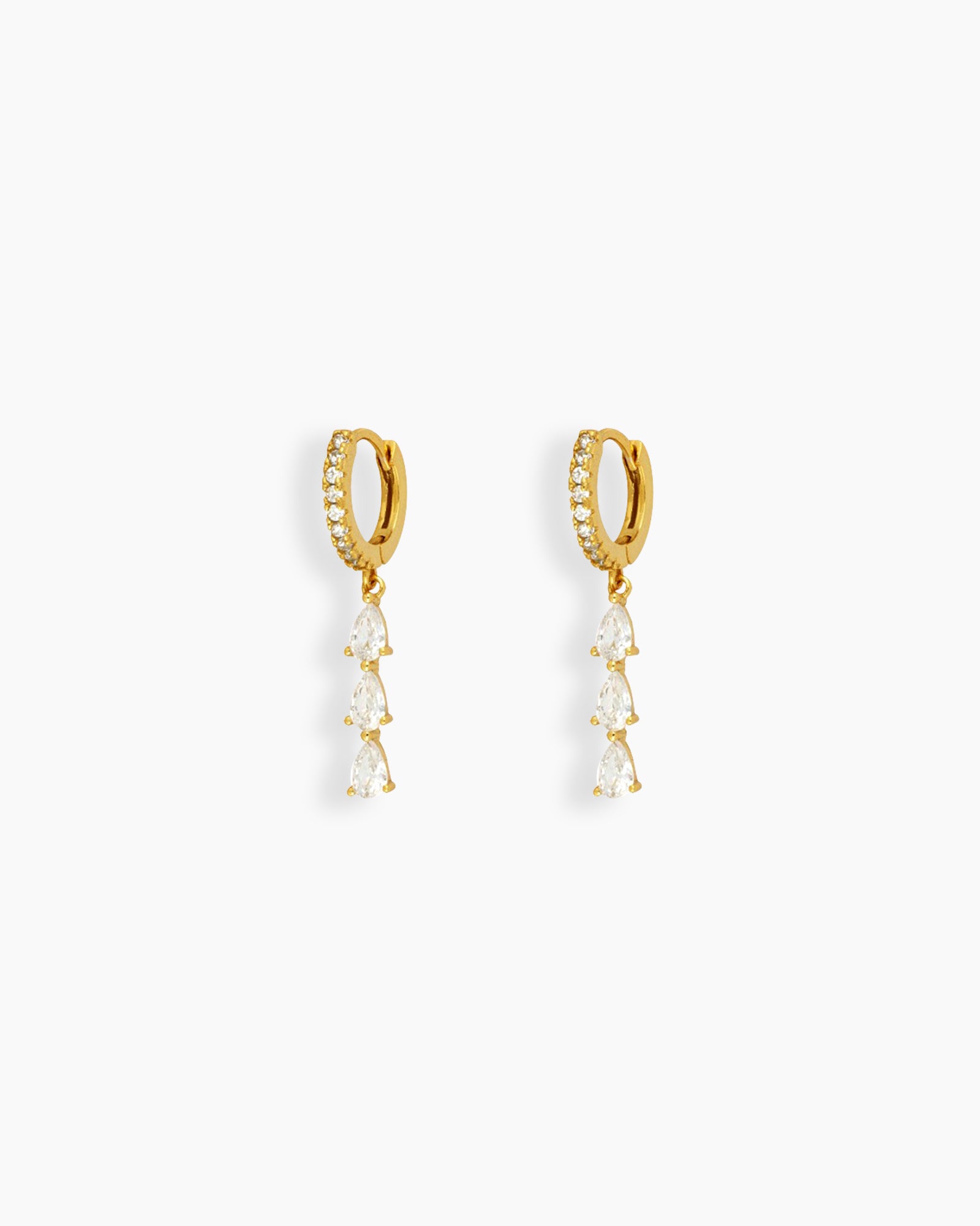 White drop earrings with three delicately suspended pear-shaped zircon stones that sway gracefully