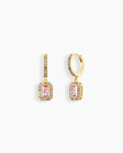 Pink drop earrings with a radiant emerald-cut zircon stone framed with pavé crystals on a classic gold hoop