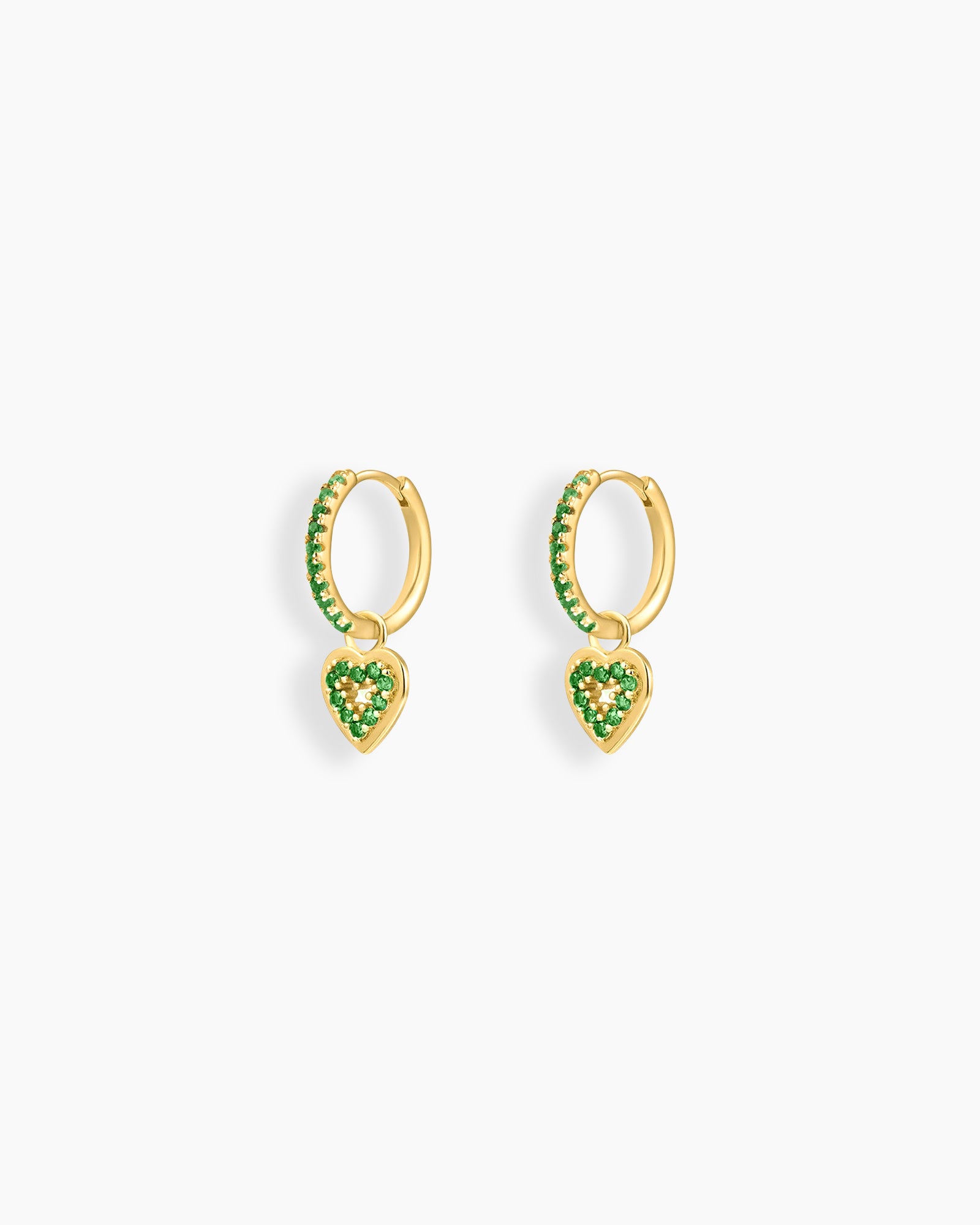 Green drop earrings with glimmering hoops and delicate, sparkling heart-shaped pendants
