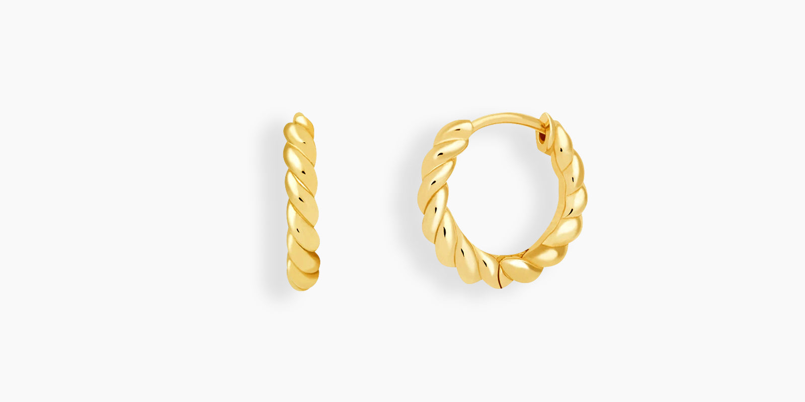 Hoop earrings with a gently sculpted rope design in a polished gold-tone finish for a refined texture