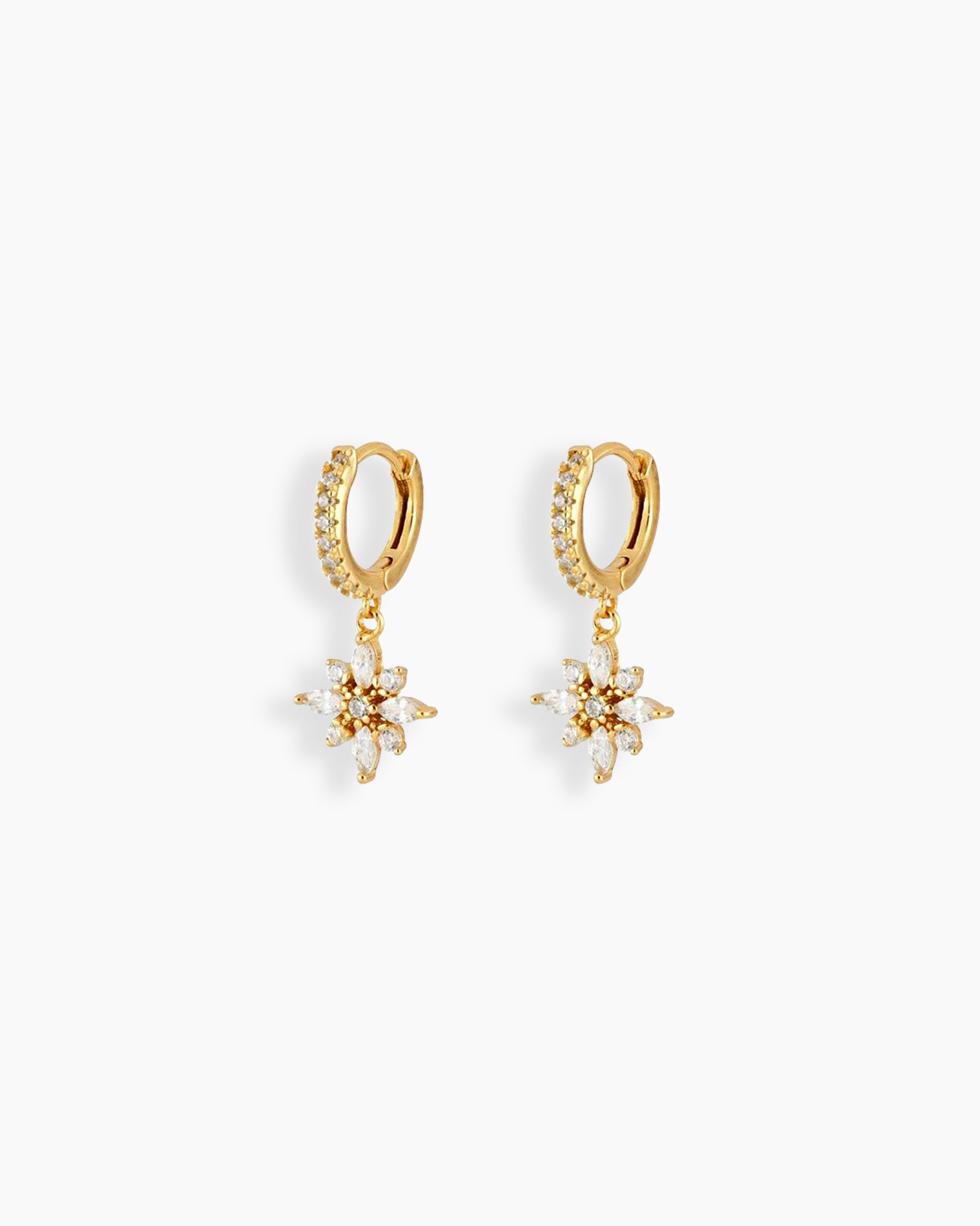 Gold huggie hoop earrings with a dainty flower-shaped charm crafted from marquise and round white zircons
