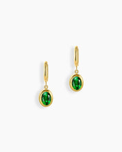 Green stone drop earrings with a richly hued oval-cut zircon in a polished gold bezel