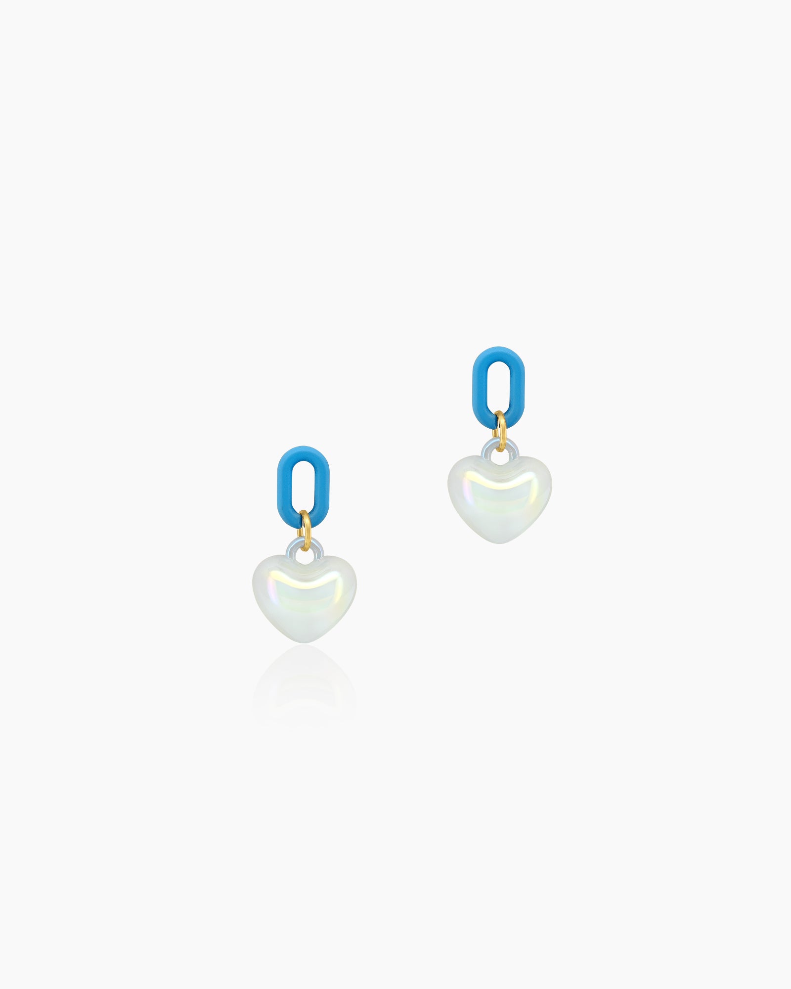 Earrings with soft matte blue rectangular links paired with iridescent, puffed glass hearts