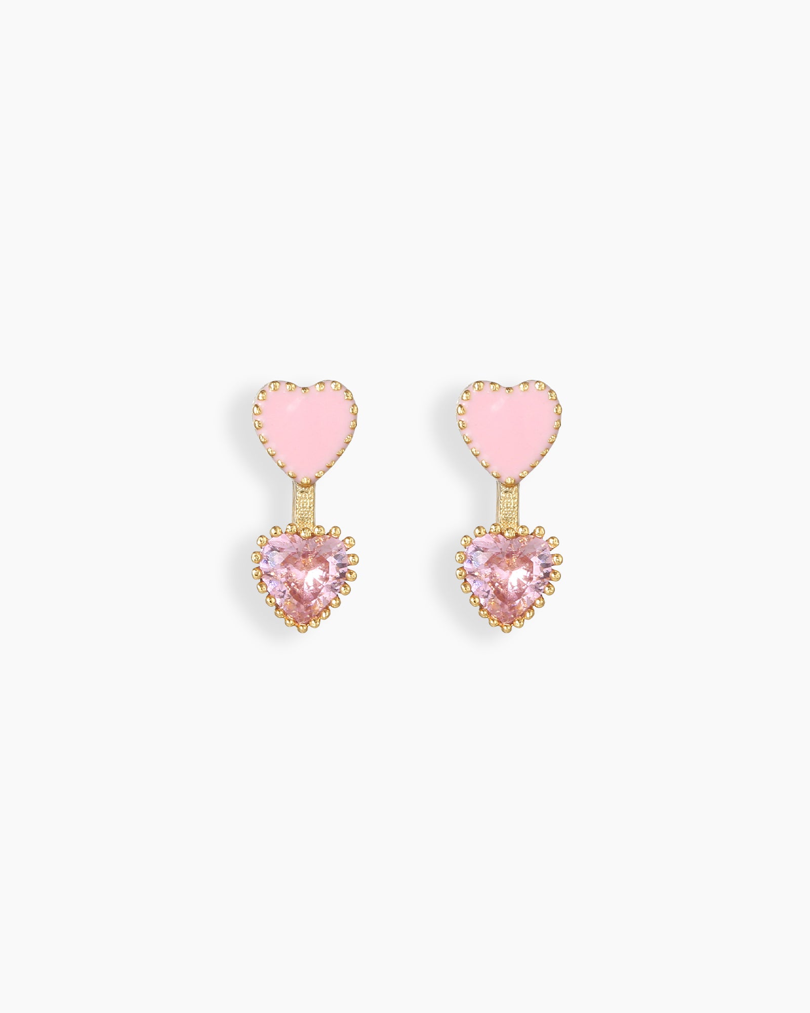 Earrings with a charming duo of hearts—one soft pink enamel and one heart-shaped zircon