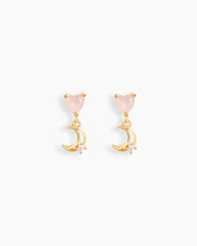Drop earrings with dainty heart-shaped pink zircons paired with gold-tone crescent moons