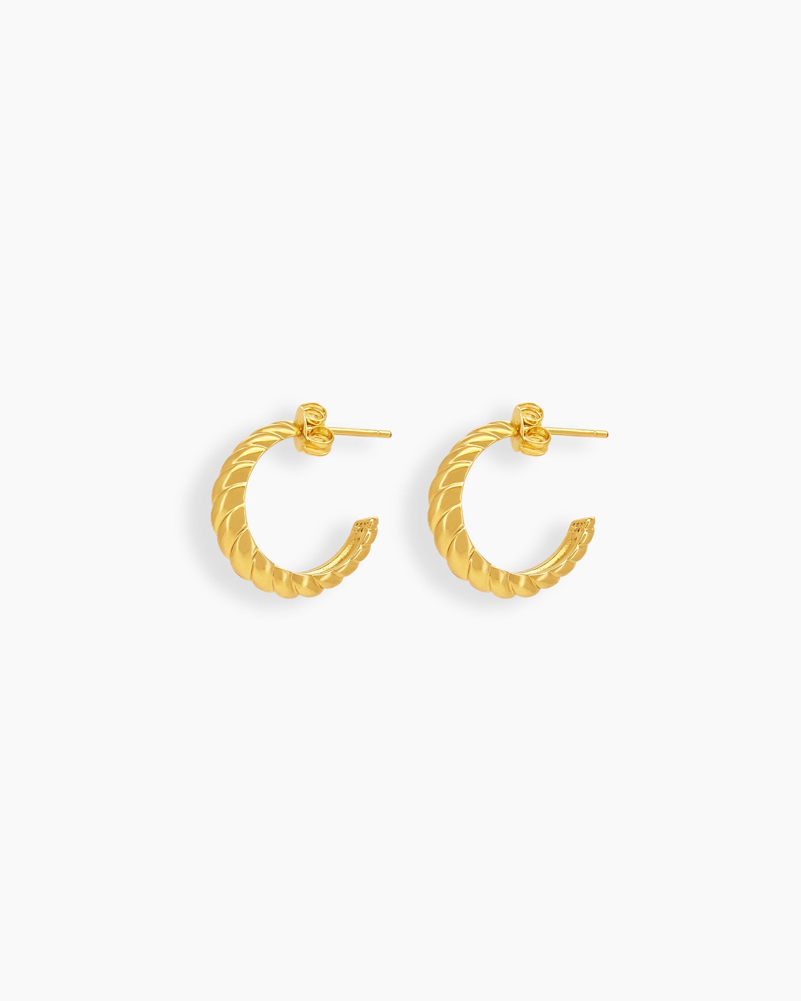 C-shaped hoop earrings in a bold, sculptural, rope-inspired texture for a vintage twist