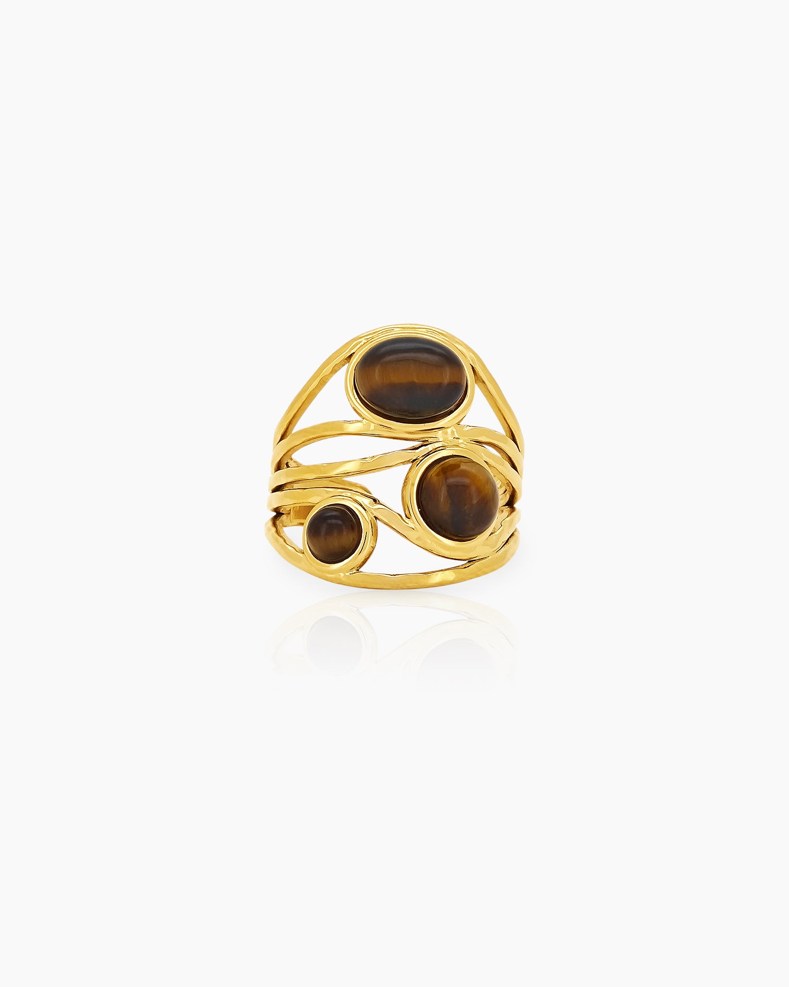 An open-form ring with shimmering natural tiger eye stones on a flowing, vintage-inspired gold band