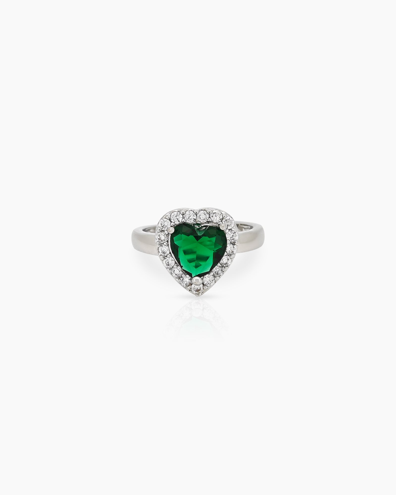 A romantic green ring with a heart-cut zircon stone framed by a border of brilliant pavé crystals