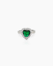 A romantic green ring with a heart-cut zircon stone framed by a border of brilliant pavé crystals