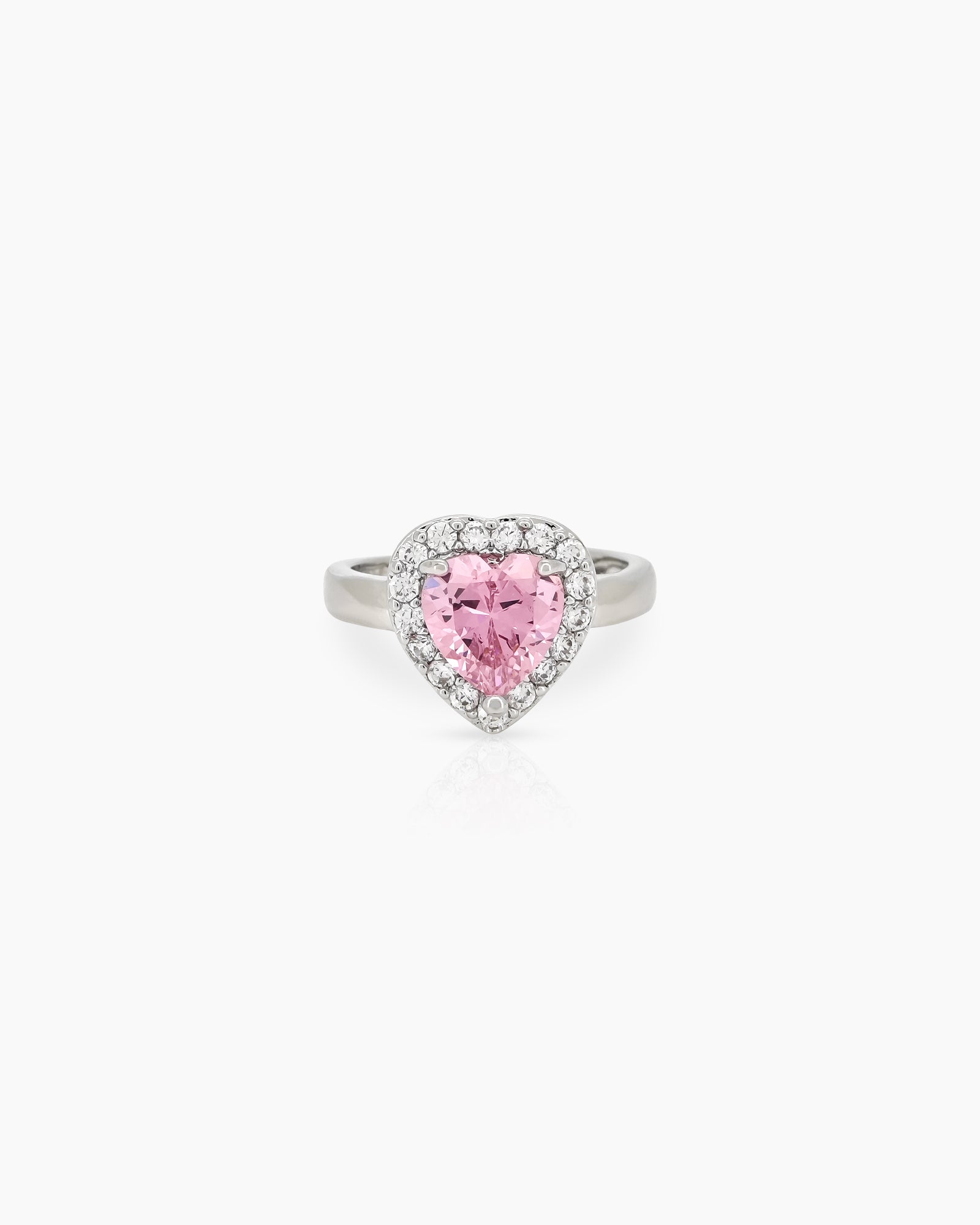A romantic pink ring with a heart-cut zircon stone framed by a border of brilliant pavé crystals