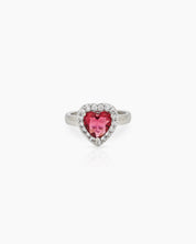 A romantic red ring with a heart-cut zircon stone framed by a border of brilliant pavé crystals