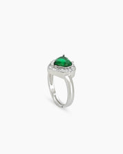 A romantic green ring with a heart-cut zircon stone framed by a border of brilliant pavé crystals