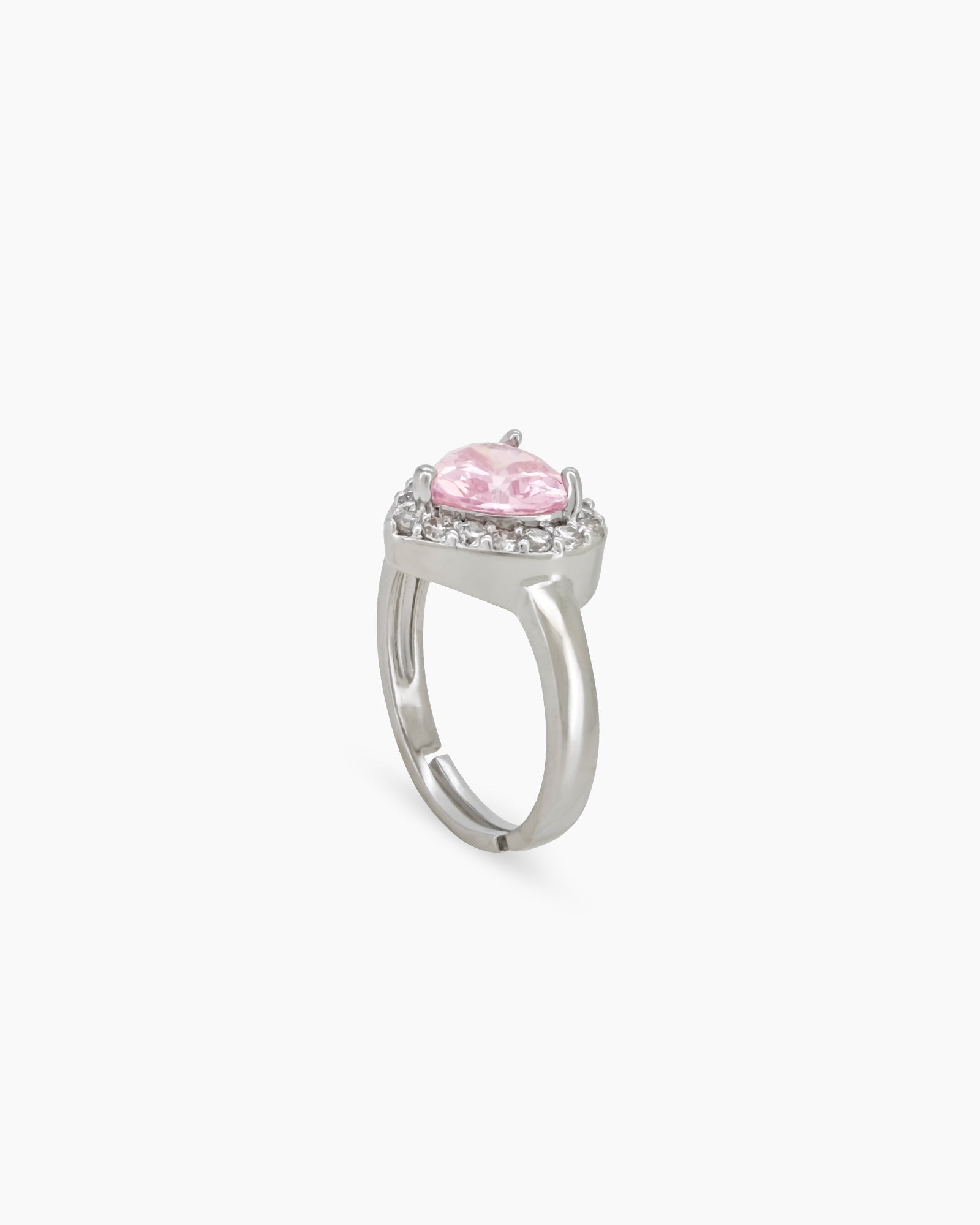 A romantic pink ring with a heart-cut zircon stone framed by a border of brilliant pavé crystals