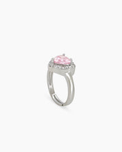 A romantic pink ring with a heart-cut zircon stone framed by a border of brilliant pavé crystals