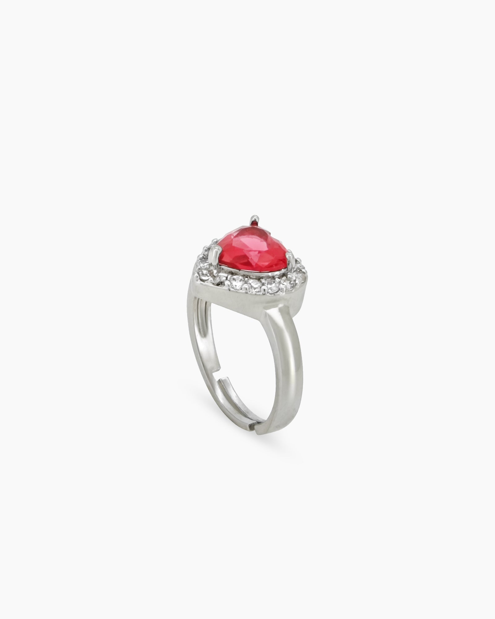 A romantic red ring with a heart-cut zircon stone framed by a border of brilliant pavé crystals