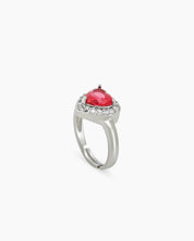 A romantic red ring with a heart-cut zircon stone framed by a border of brilliant pavé crystals