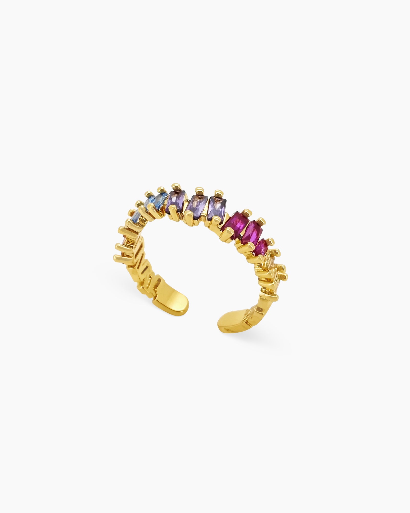 An adjustable colored gold-tone band encrusted with a row of baguette-cut zircon stones