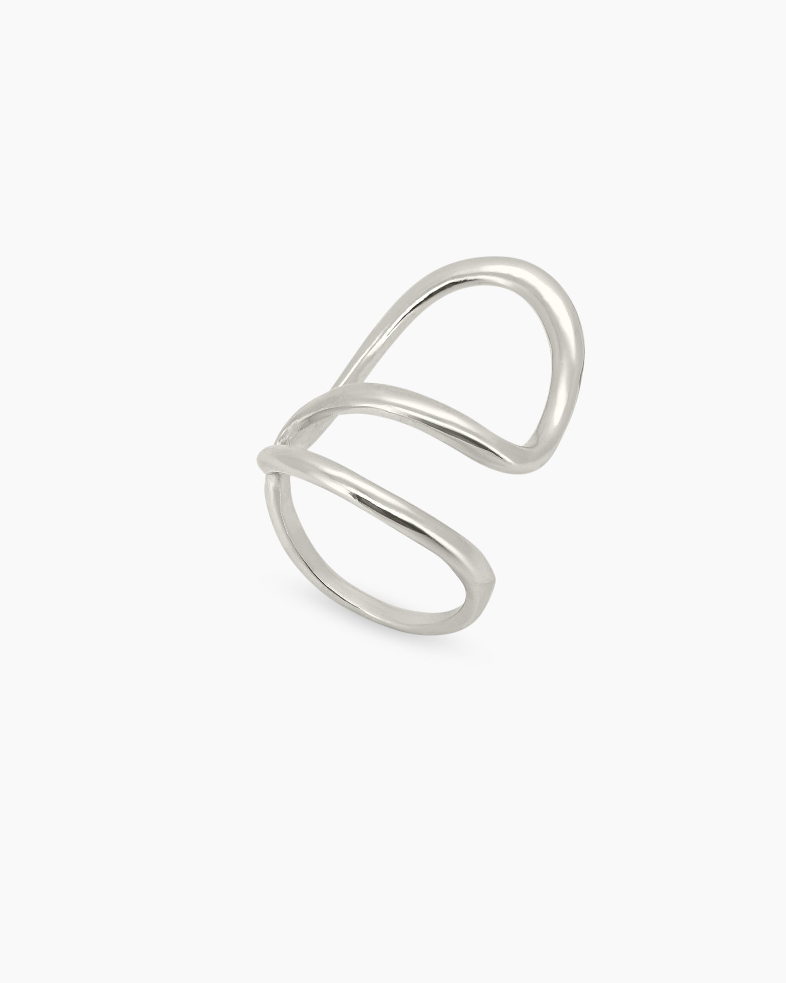 A sleek silver ring with a fluid, open curve and a high-shine finish for a modern, sculptural look
