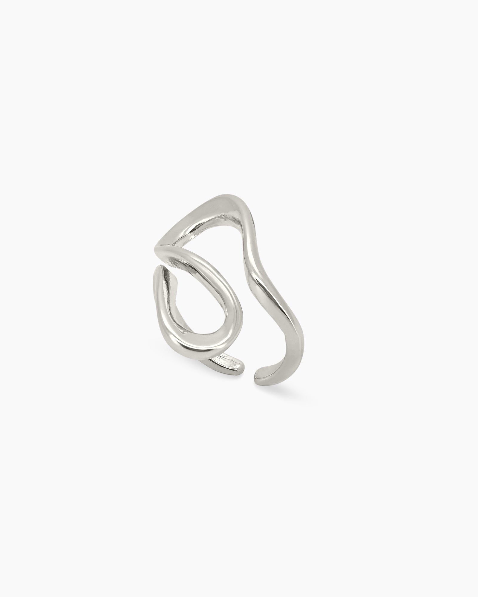 A high-shine silver ring that flows in a continuous wave with an open silhouette and smooth curves