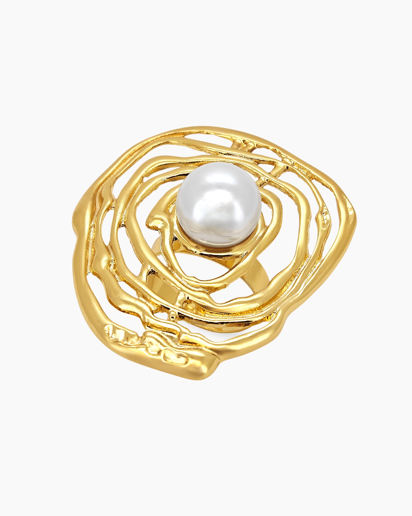 A sculptural gold ring with an abstract shell design cradling a luminous faux pearl