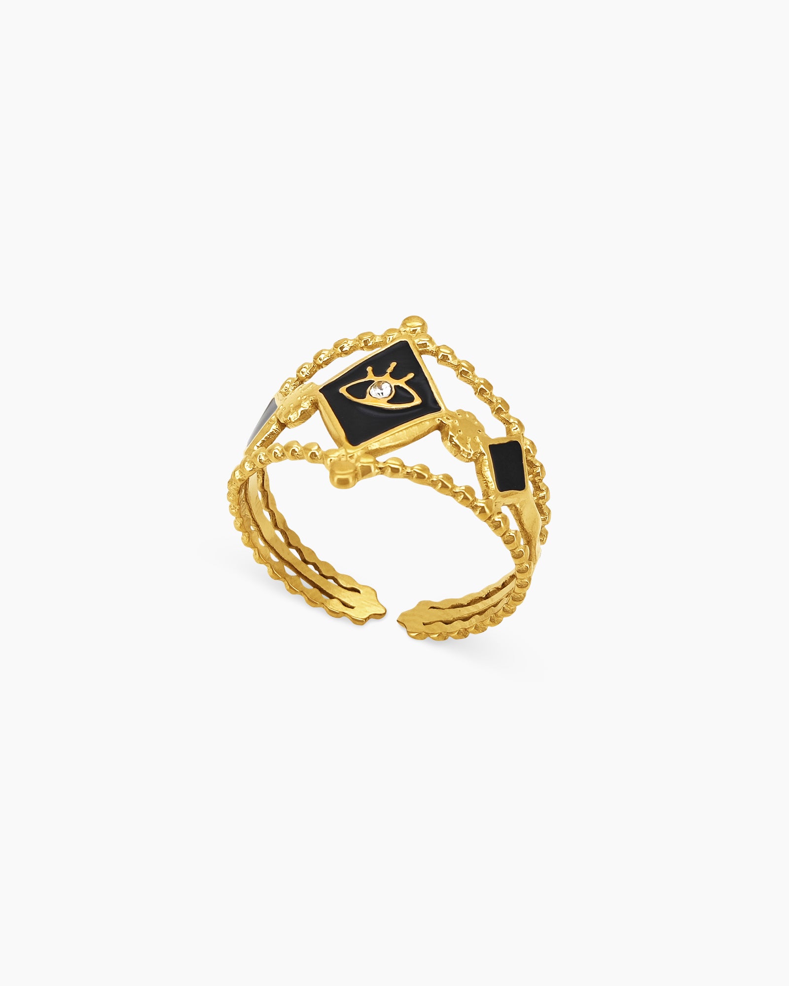A bold black ring that blends the look of three rings into one, with beaded textures and black enamel panels