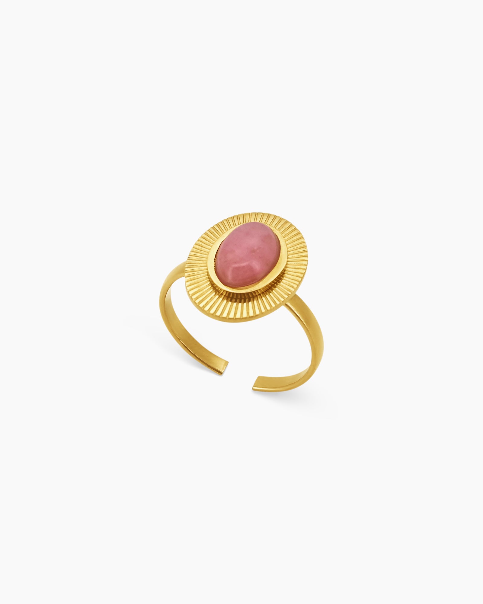 A Pink Rhodonite adjustable ring with a radiant gold-toned band and fine sunburst detailing