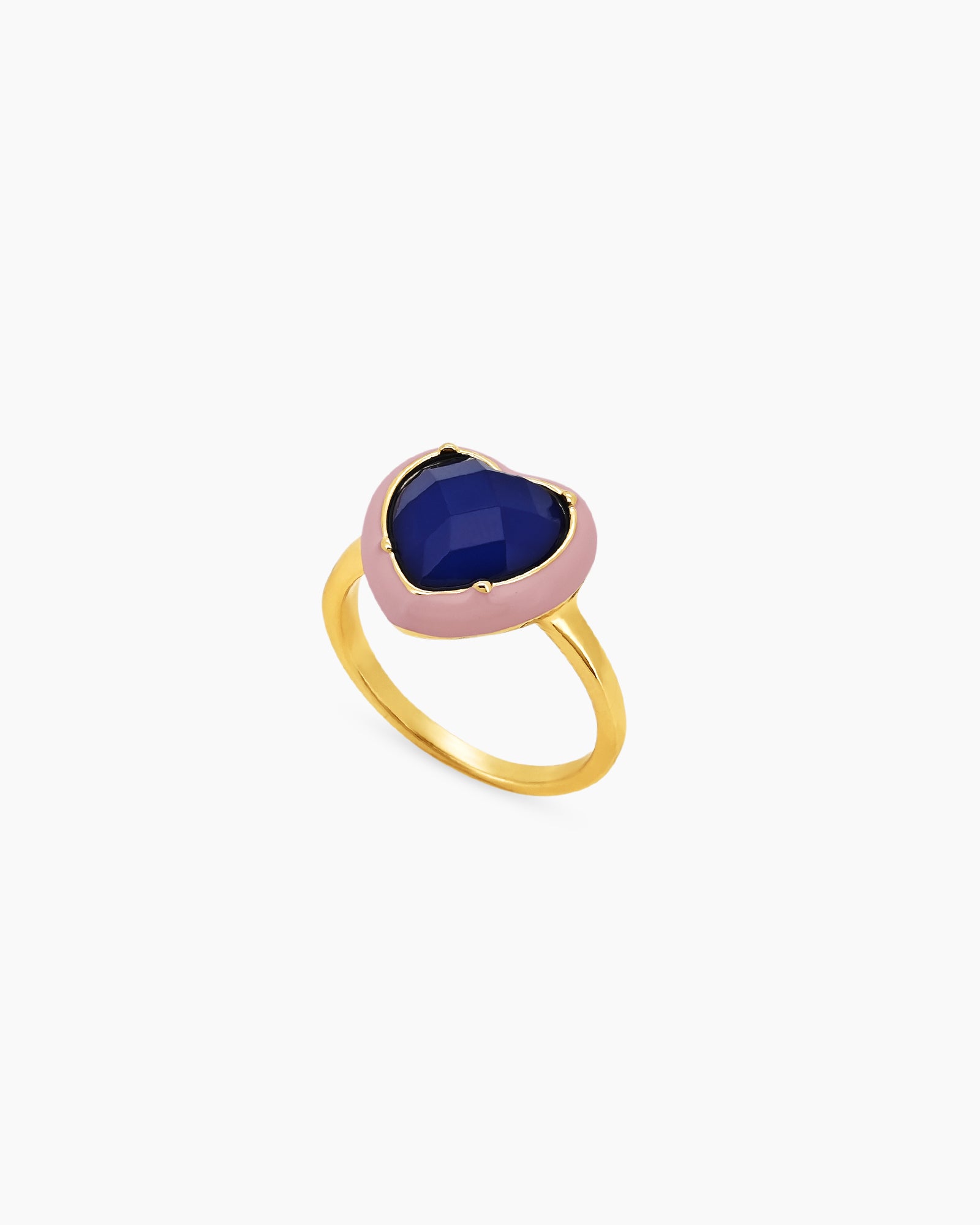 A blue-pink cocktail ring with an oversized heart-shaped stone cradled by a glossy enamel bezel