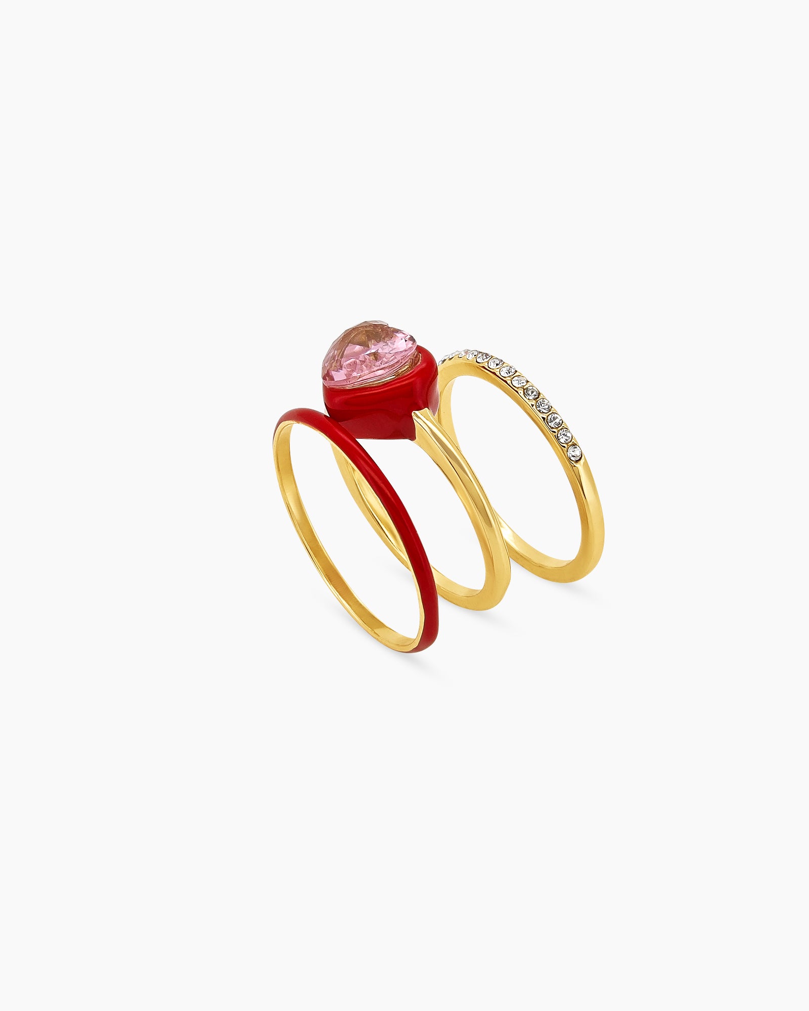 A set of red stackable rings featuring a mix of sleek enamel finishes, polished bands, and subtle sparkle