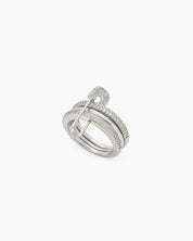 A silver stacked band ring with a crystal-studded safety pin detail for a stylish, daring twist