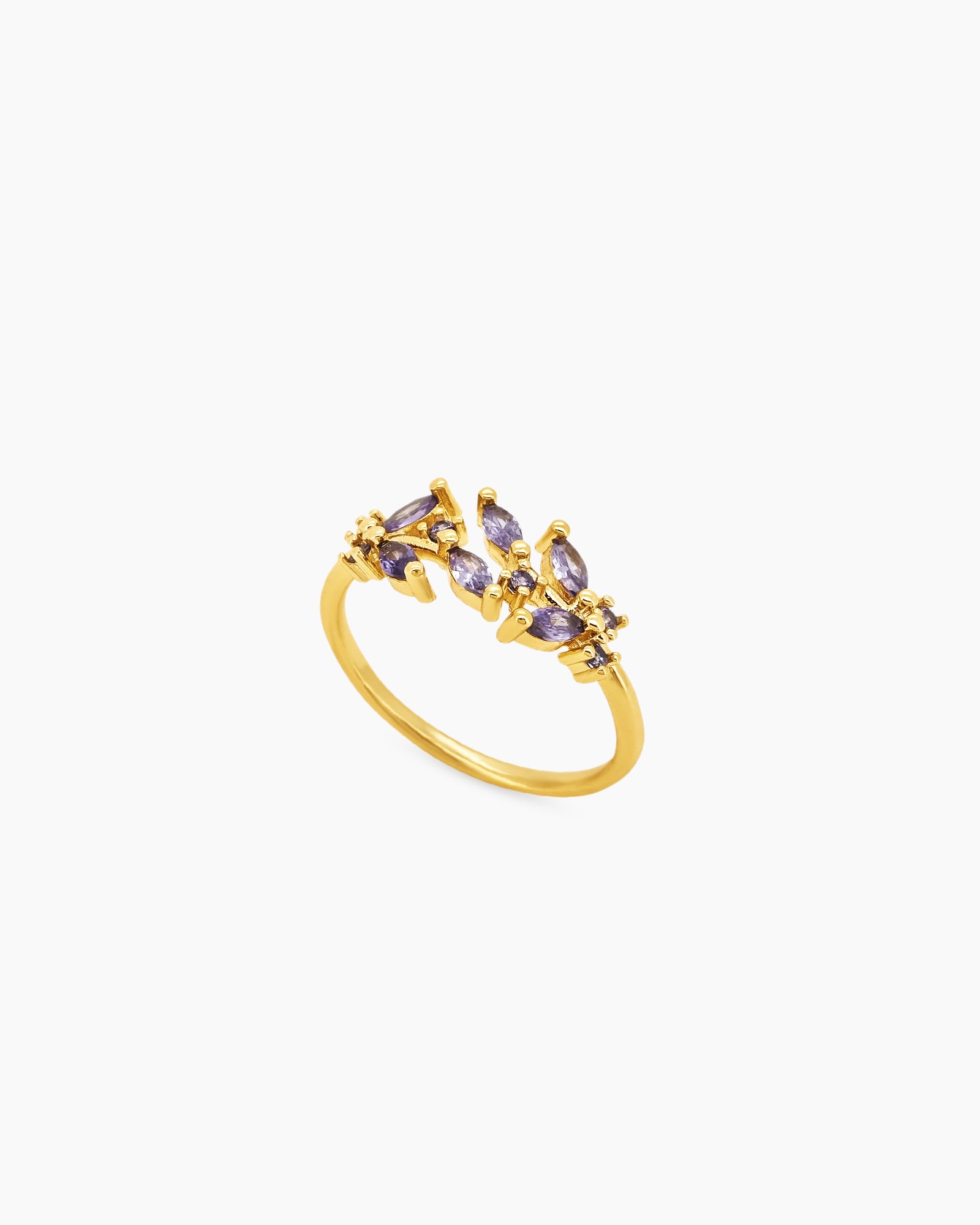 A purple open ring with clusters of marquise-cut zircons that bloom from each side of the band