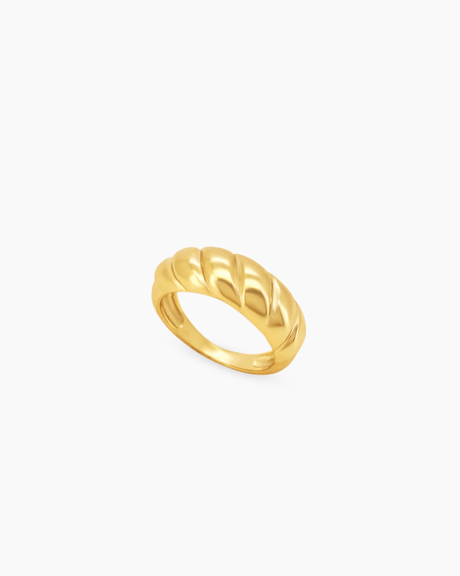 A ring with a sculptural twist texture and a chunky, domed silhouette for a bold, vintage-inspired look